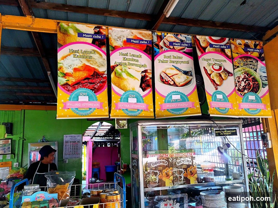 Food stall interior with promotional banners