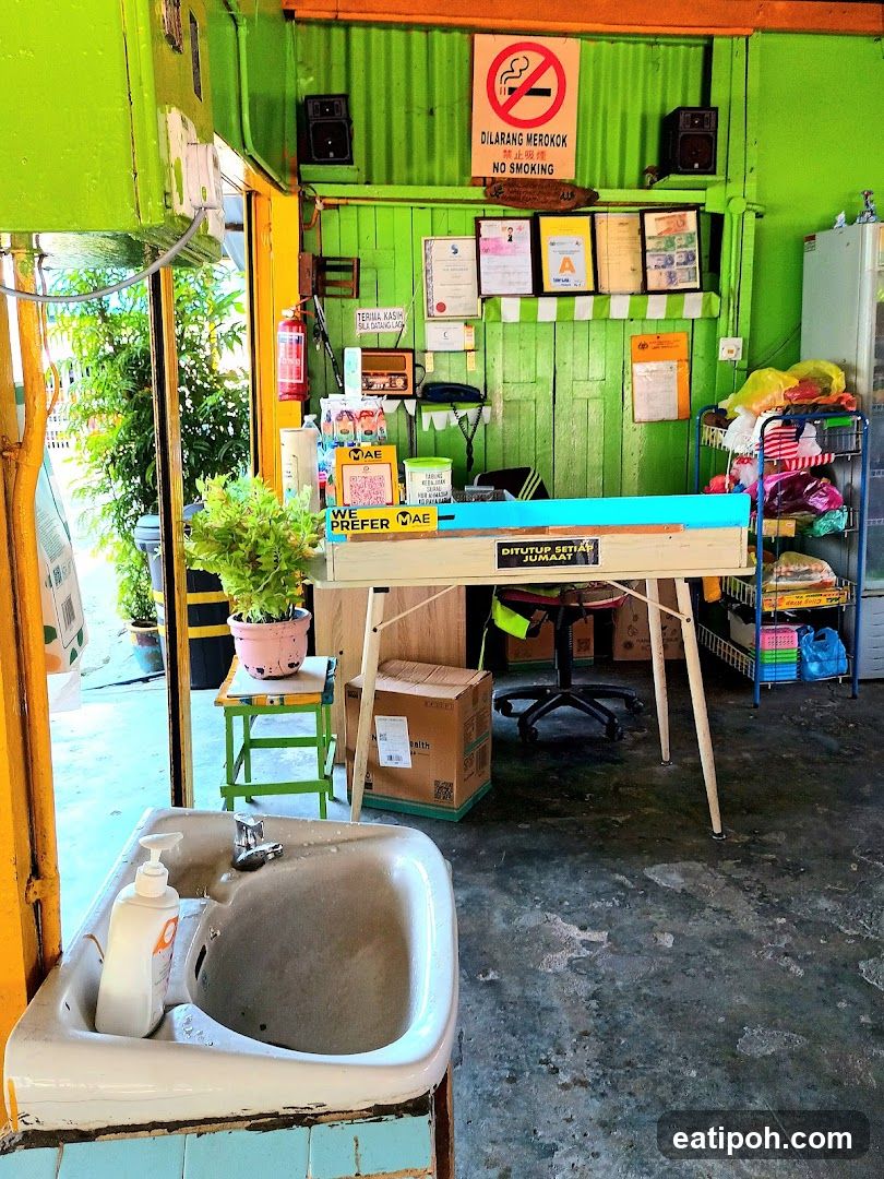 Interior of a small shop with green walls