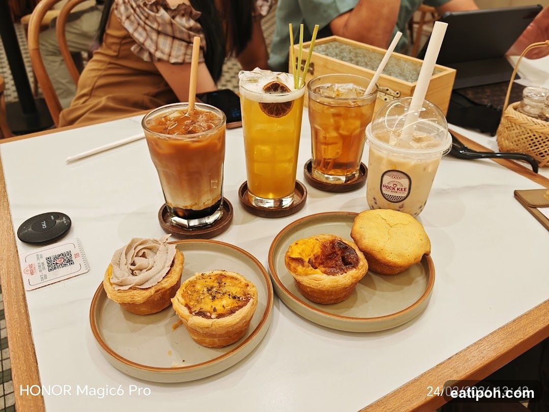 Table with beverages and pastries