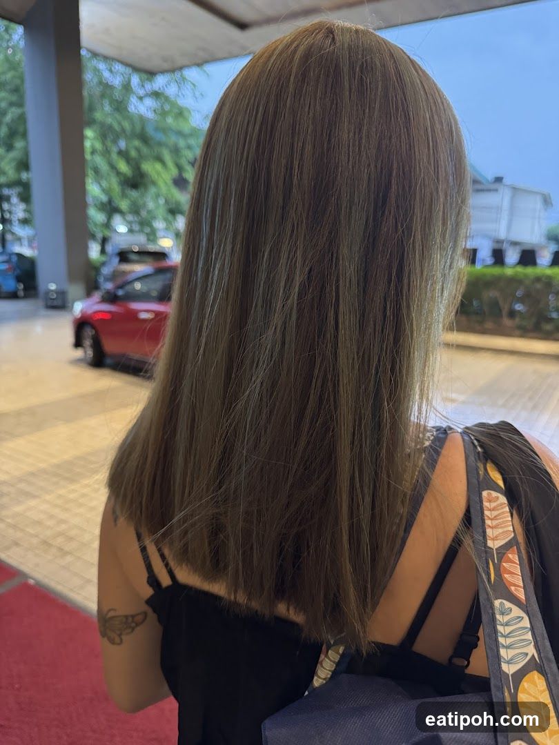 Back view of person outside building