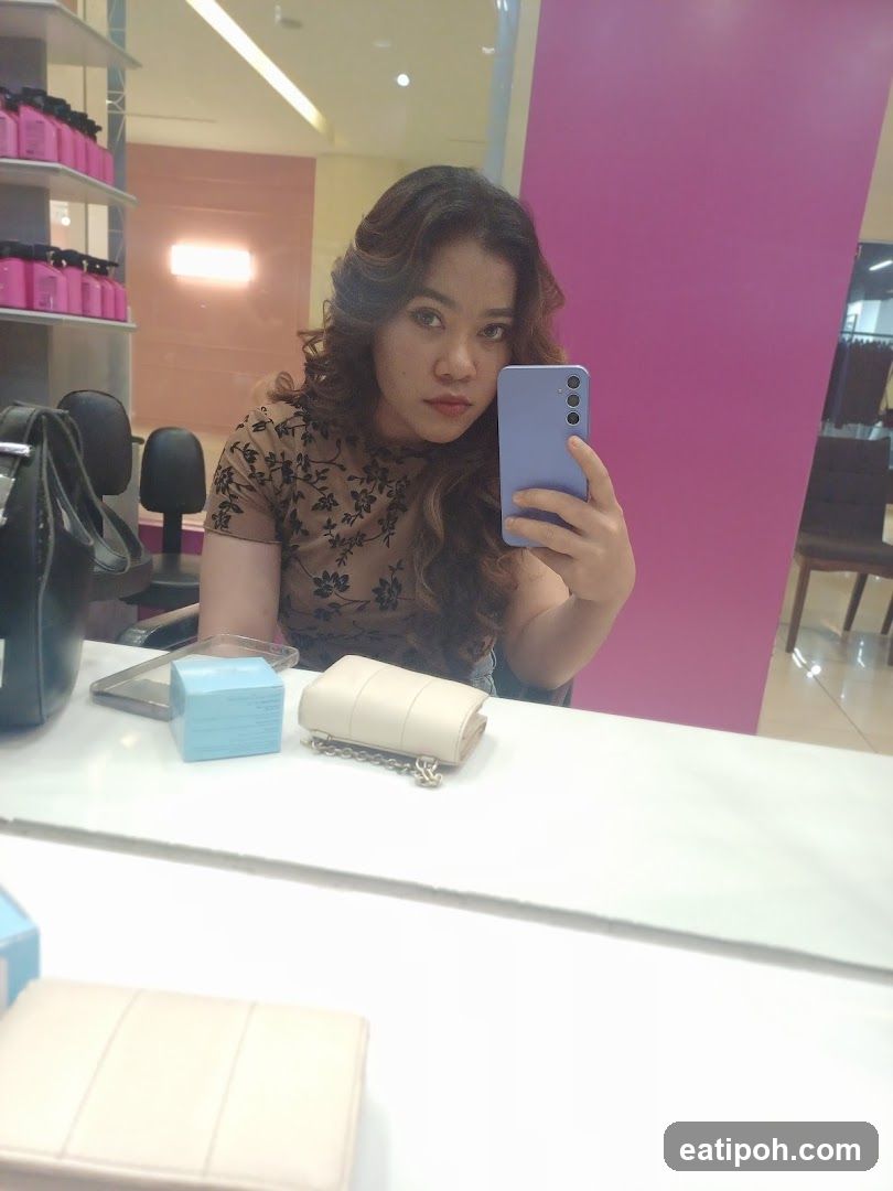 Mirror selfie in retail setting