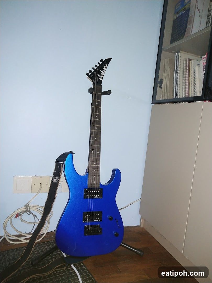 Blue Electric Guitar in Room