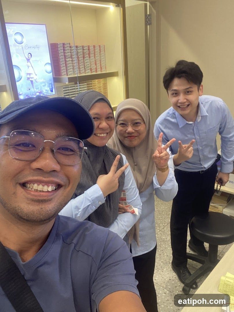 Group selfie inside a business