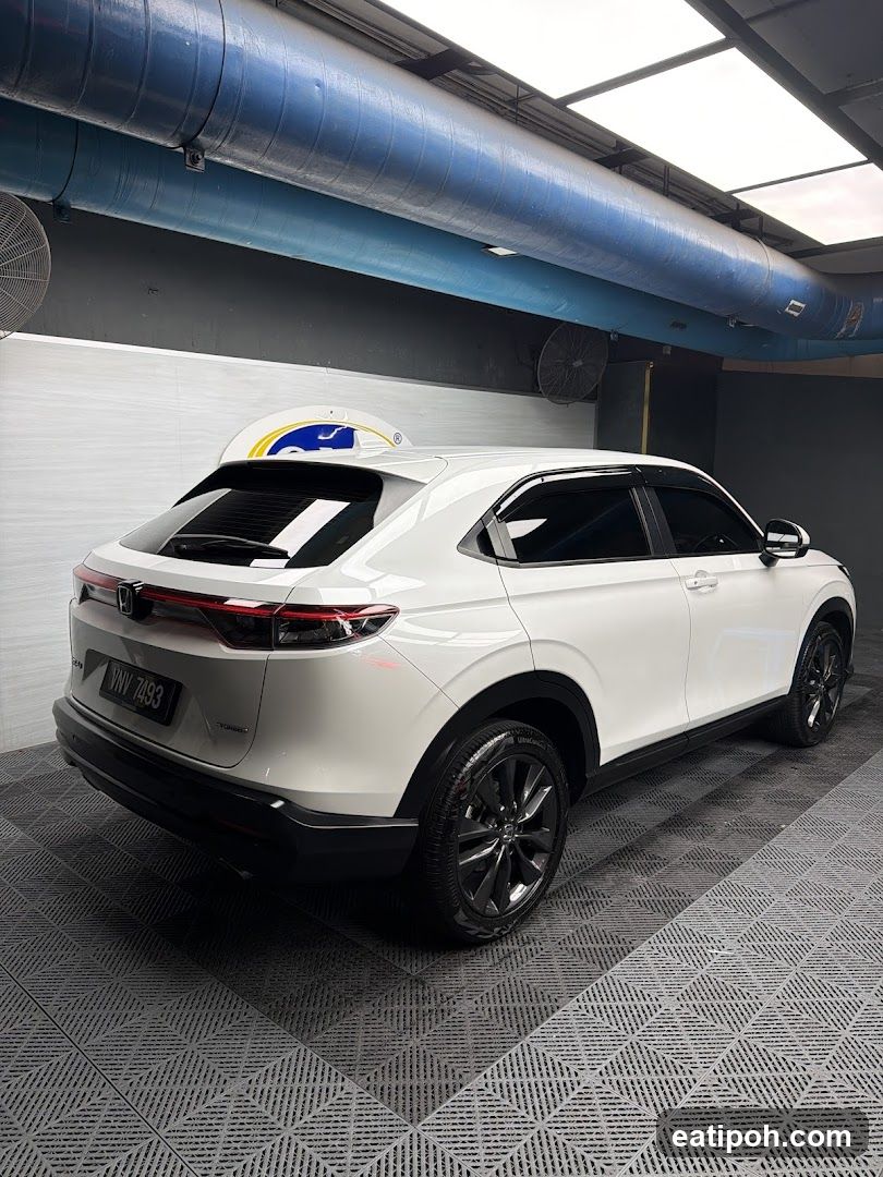 White SUV in garage
