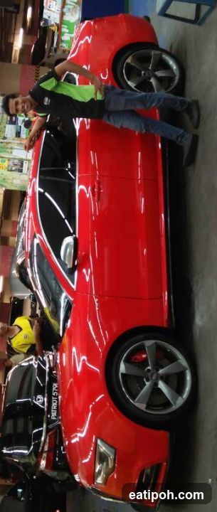 Red Car in Garage
