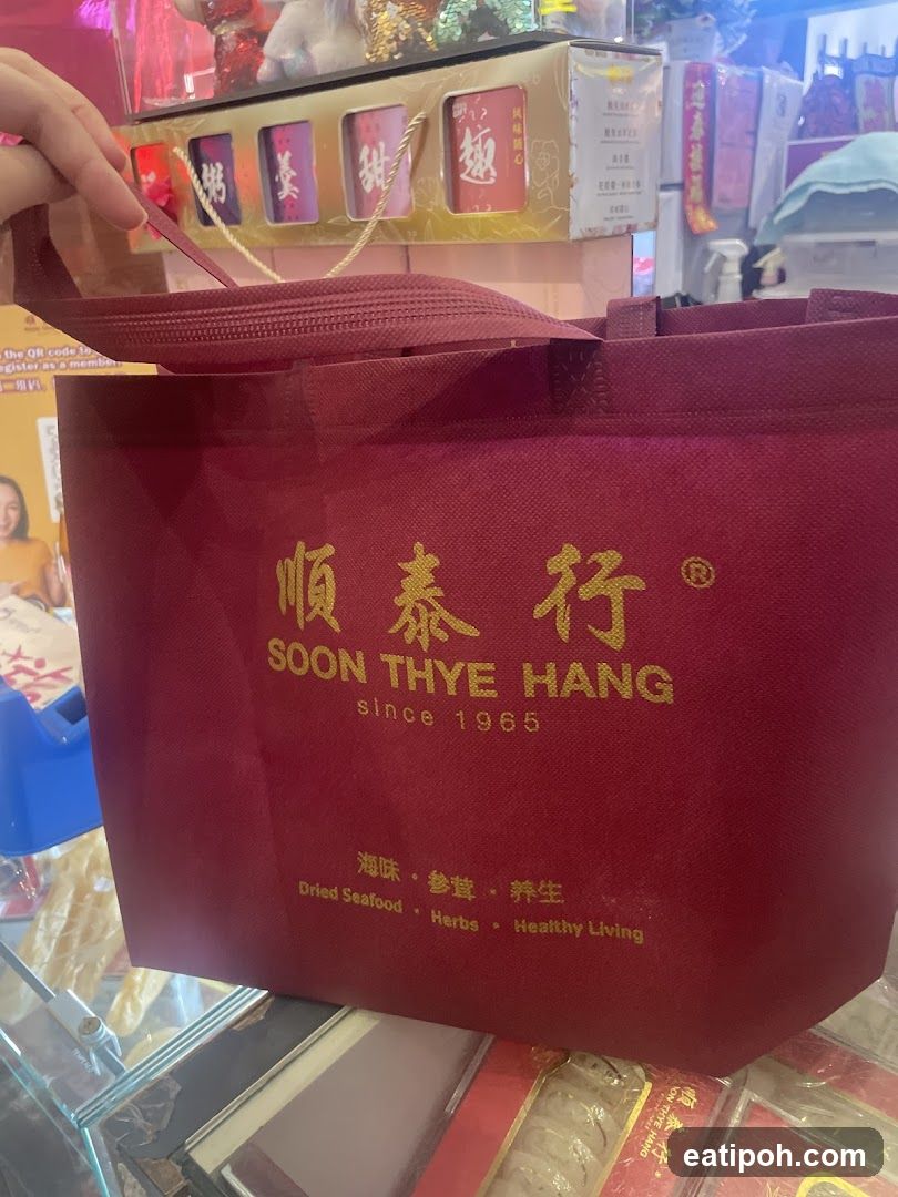 Red shopping bag from Soon Thye Hang