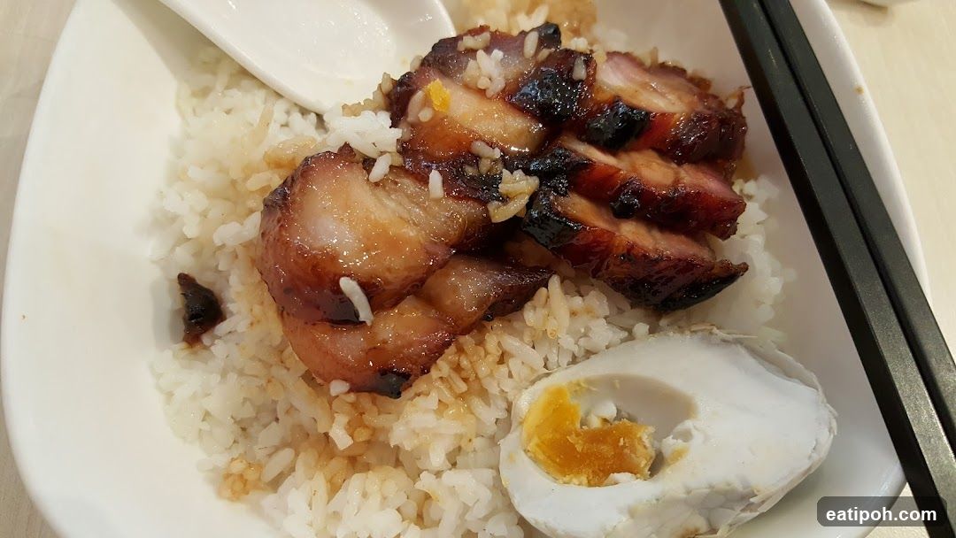Rice bowl with roasted meat and egg