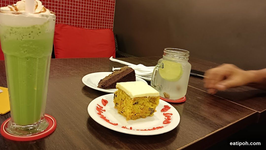 Dining Table with Desserts and Drinks
