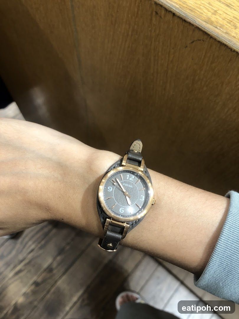 Wristwatch on Person's Arm