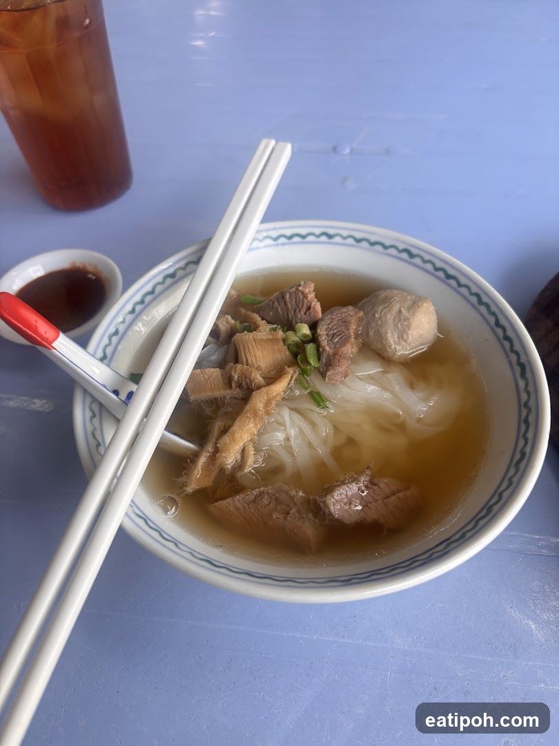 Bowl of noodle soup with chopsticks