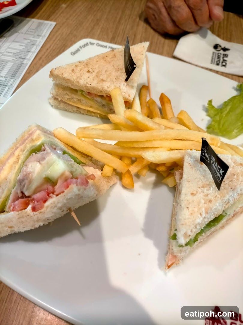 Sandwich and fries on a plate