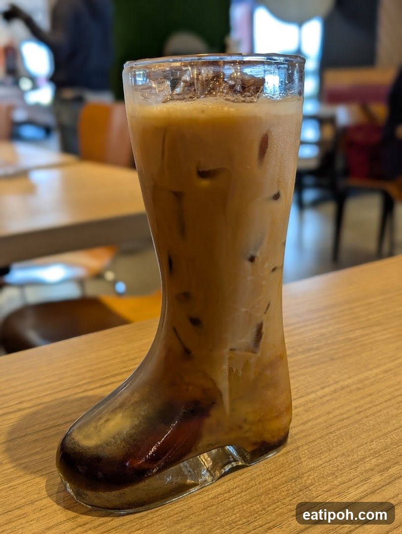 Iced beverage in boot-shaped glass