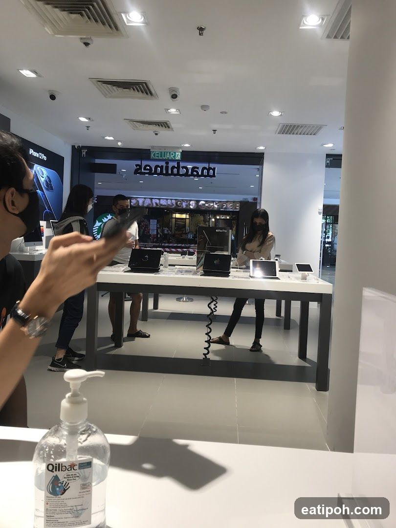 Electronics store with Starbucks in background
