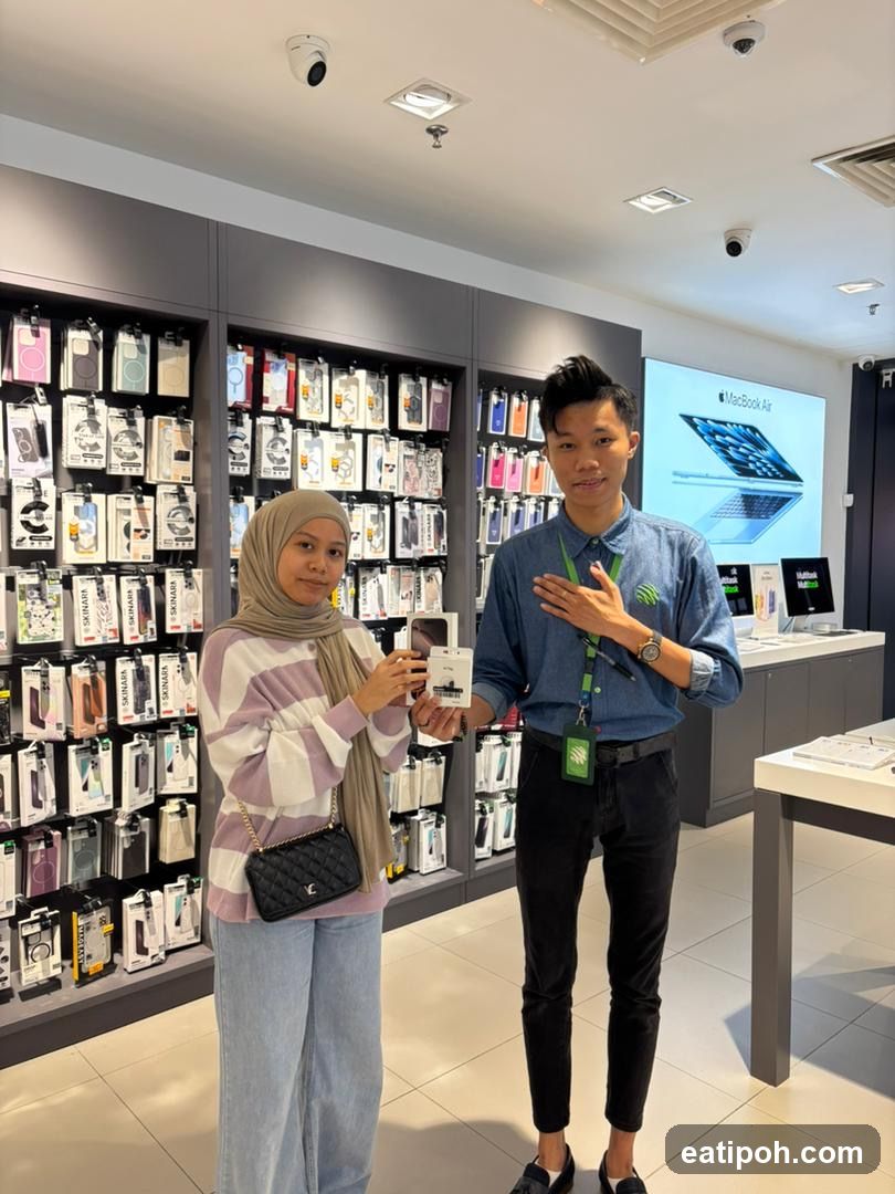 Customer and Salesperson in Electronics Store