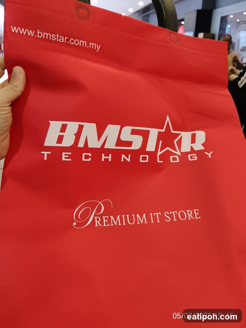 Red shopping bag with company logo