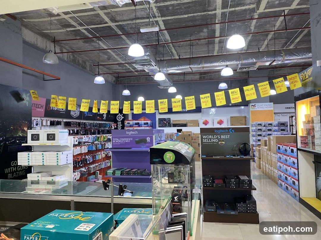Electronics store interior with sale banners
