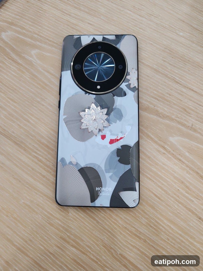 Smartphone with floral and koi fish design
