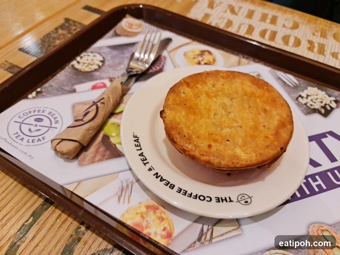 Pie on a plate with cutlery