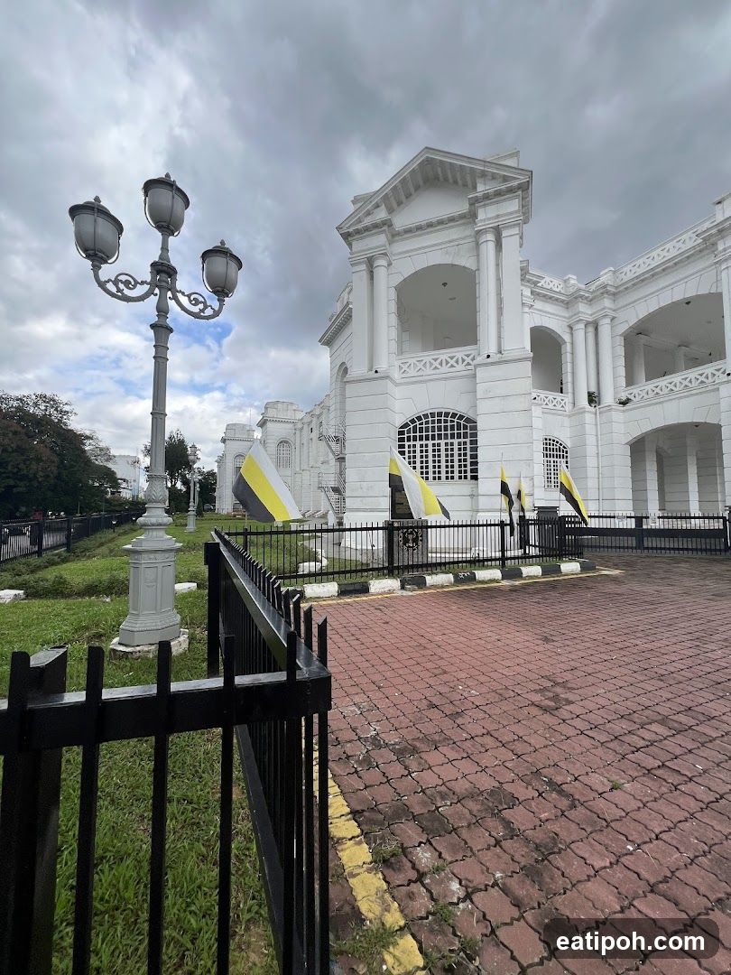 White Building with Flags
