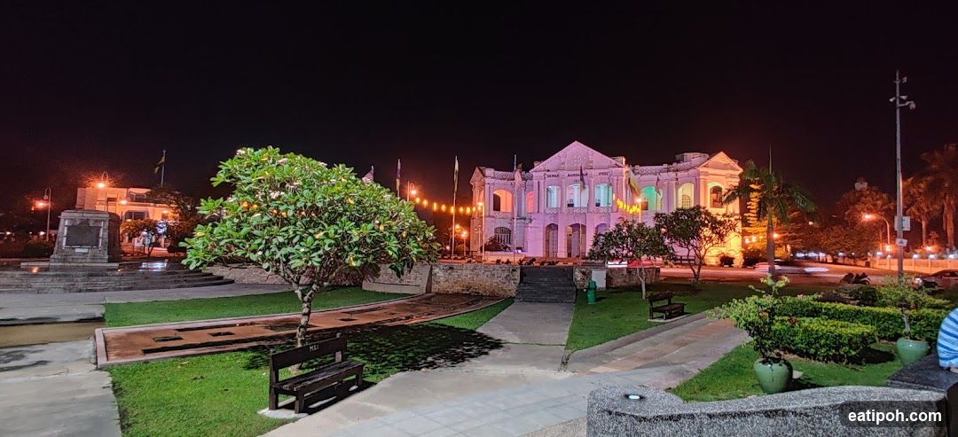 Night view of a historic building with colorful lights