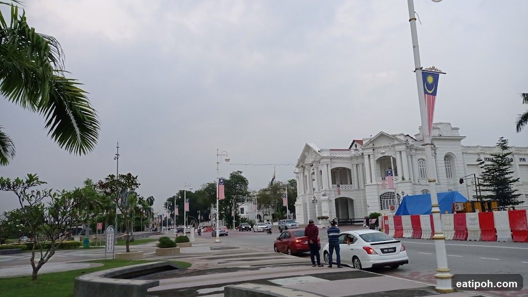 White Building with Malaysian Flags