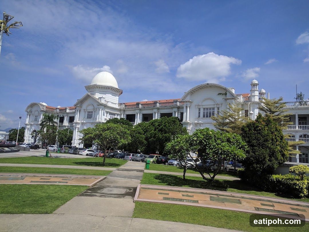 White Building with Dome and Trees