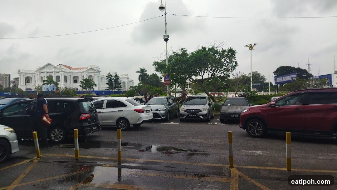 Parking Lot with Buildings in Background