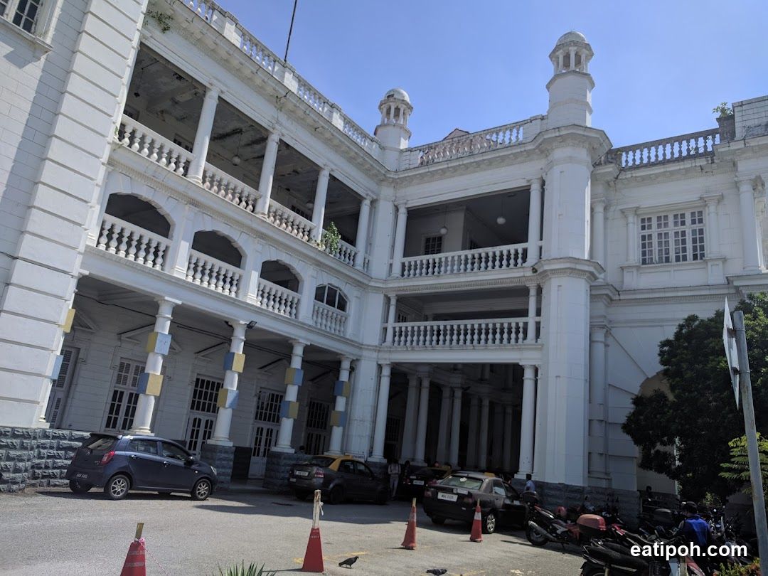 White Colonial Building with Balconies