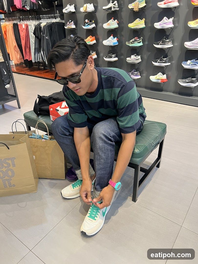 Man Tying Shoelaces in a Store