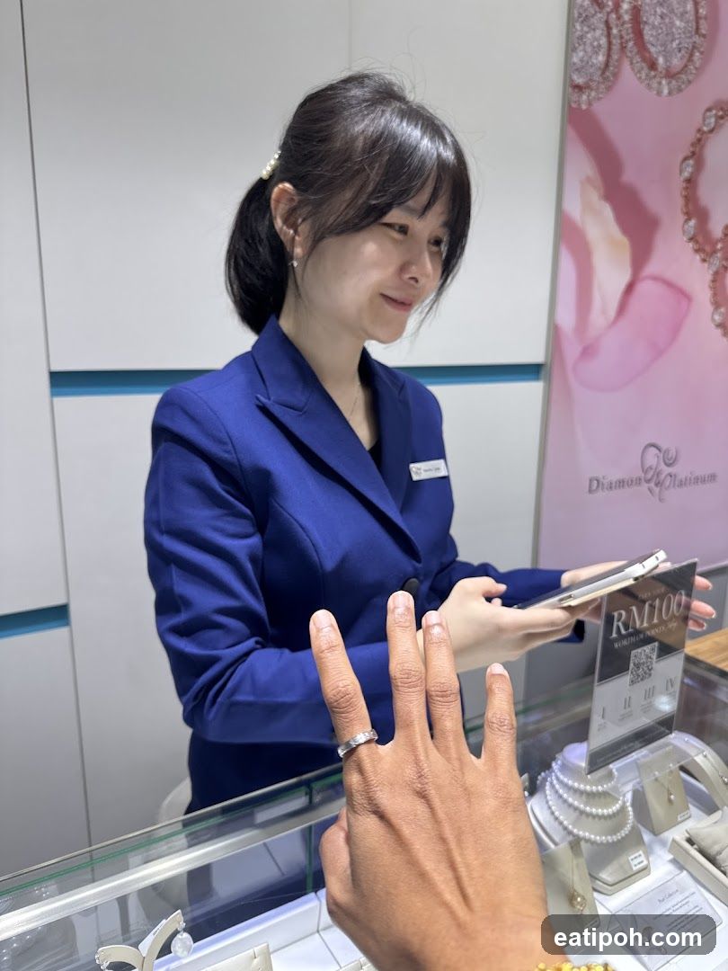 Jewelry Store Employee Assisting Customer