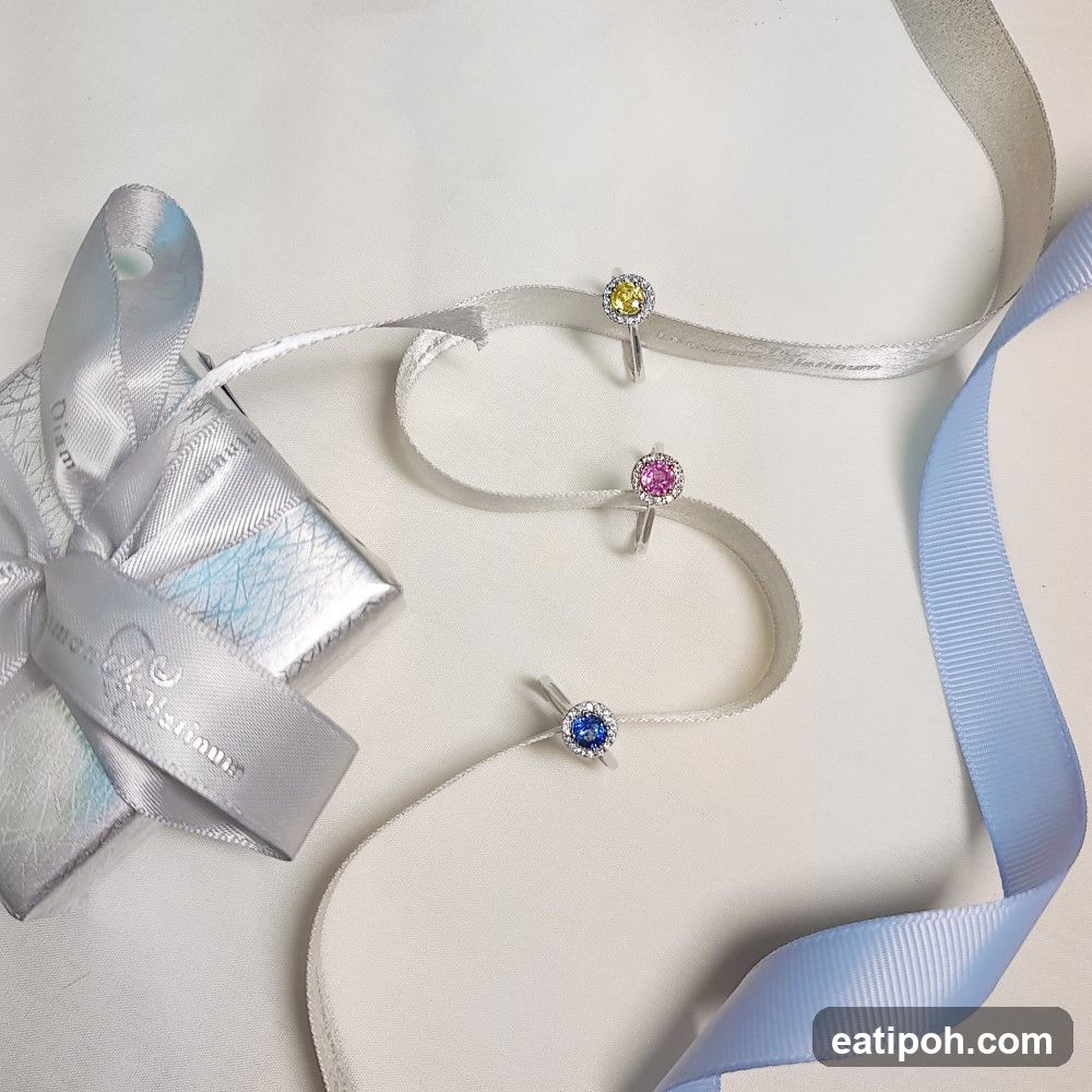 Three rings with colored gemstones
