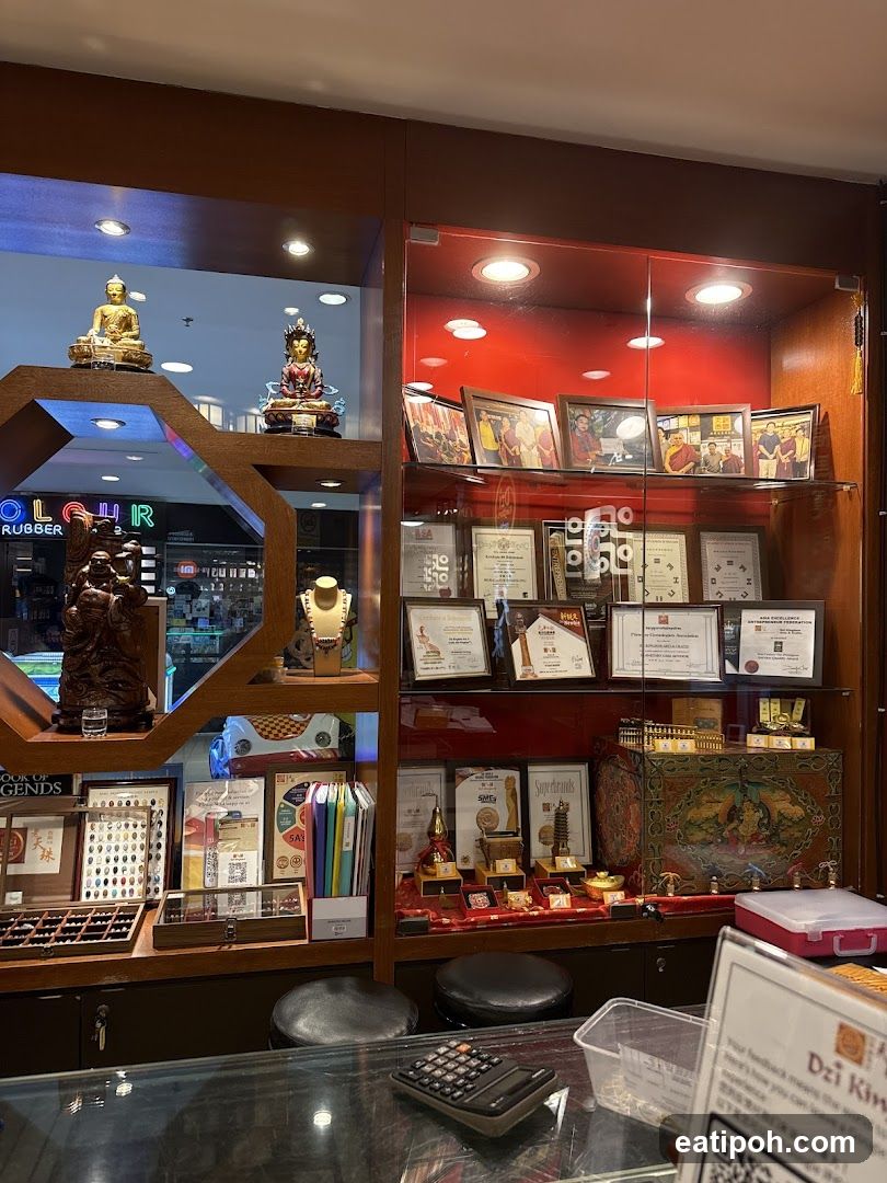 Store Display with Buddhist Statues and Artifacts