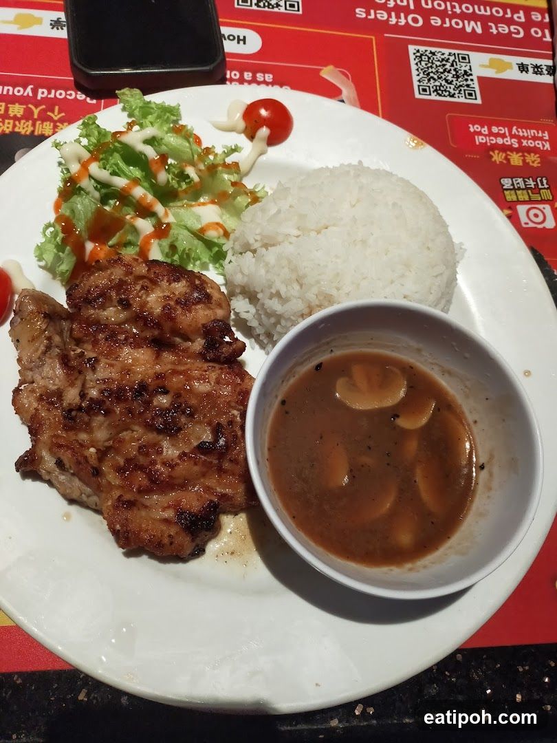 Grilled Pork Chop with Rice and Salad