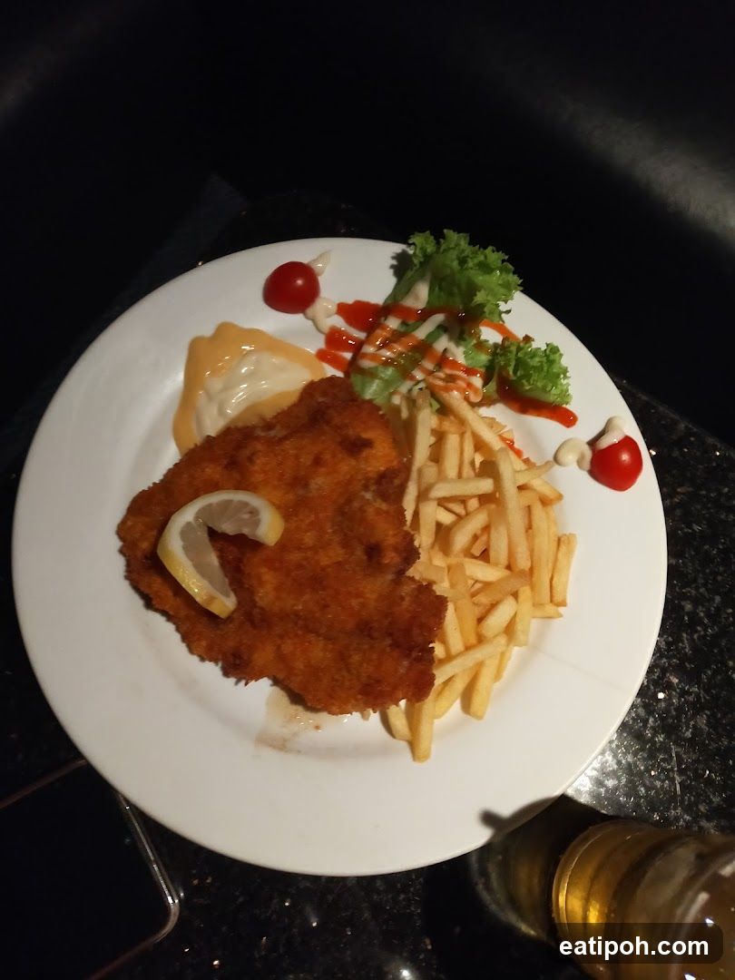 Breaded cutlet with fries