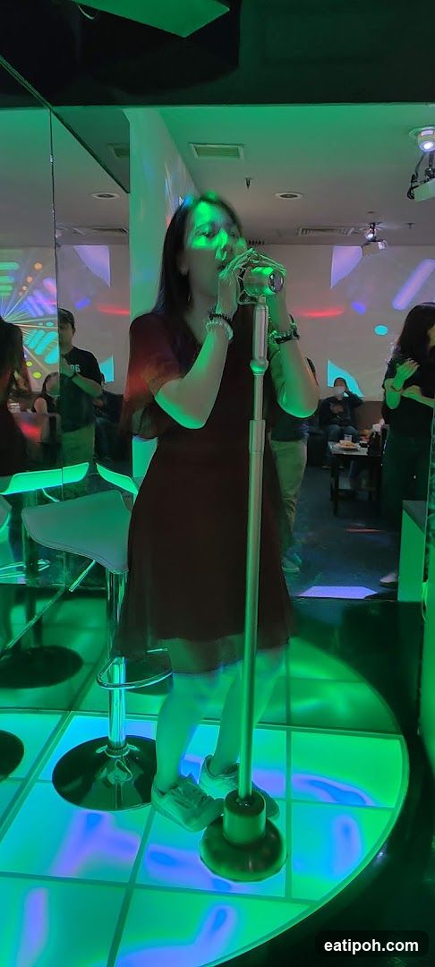 Woman singing karaoke