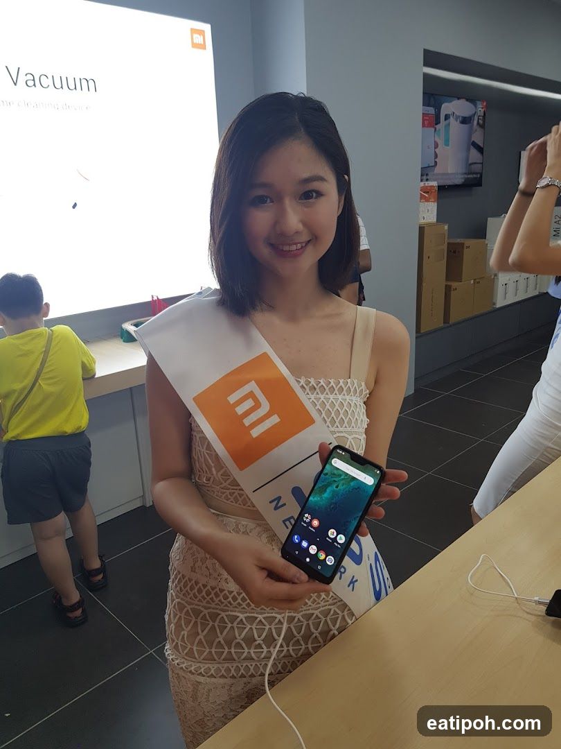 Woman holding a smartphone in a store