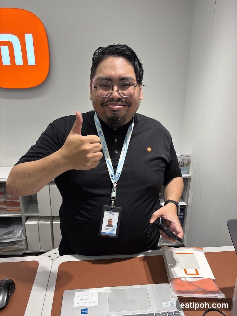 Employee giving a thumbs up