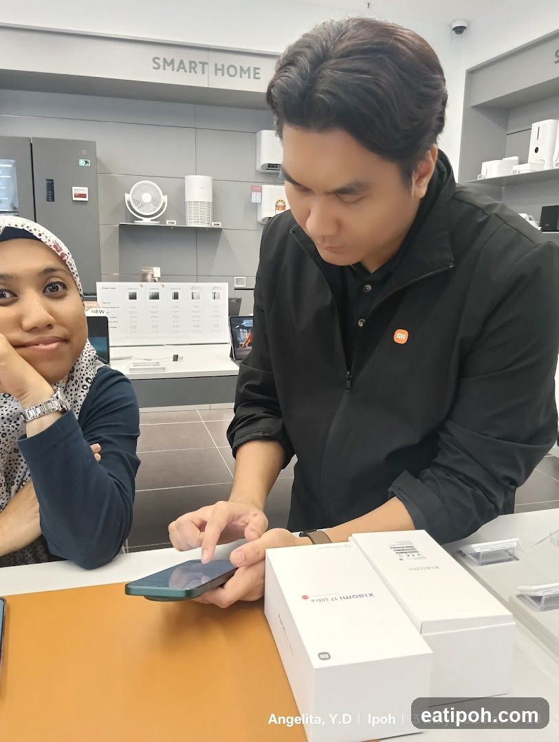 Salesperson demonstrating a smartphone