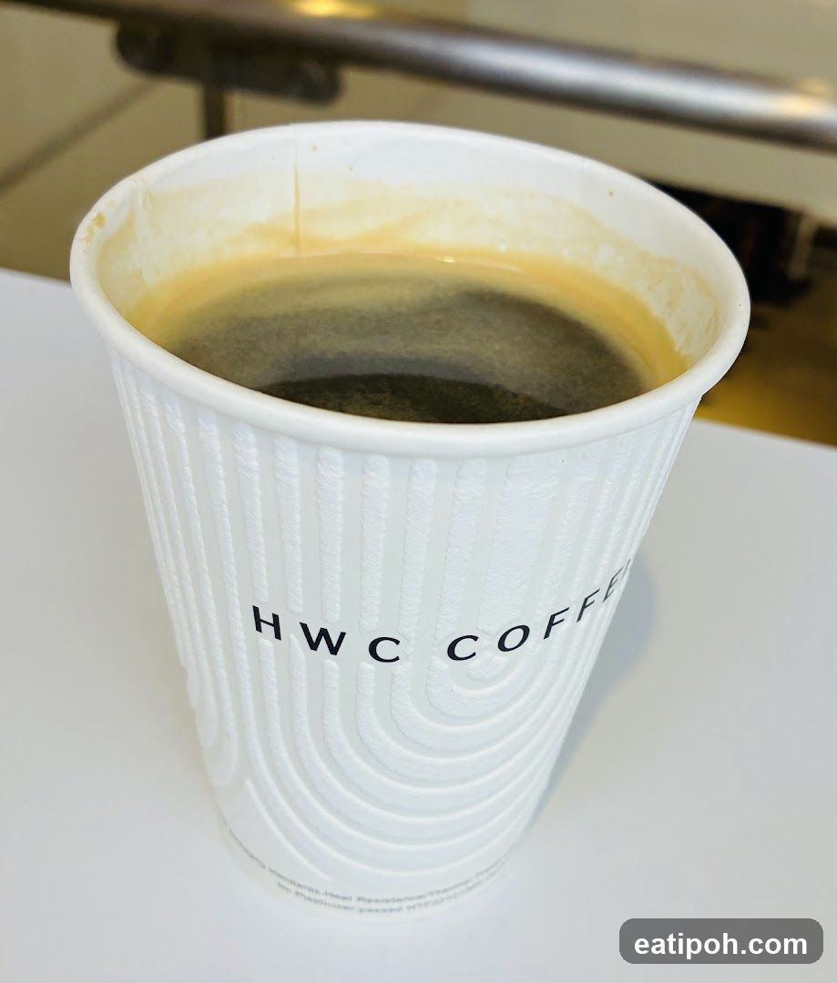 Coffee in a branded cup