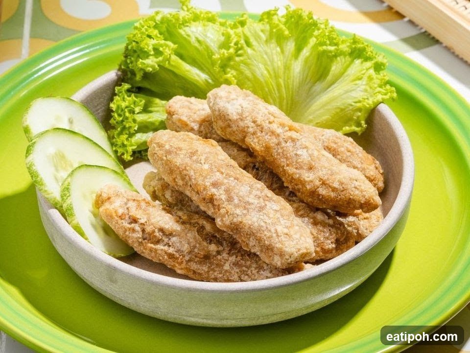 Fried Fish Cakes with Cucumber and Lettuce