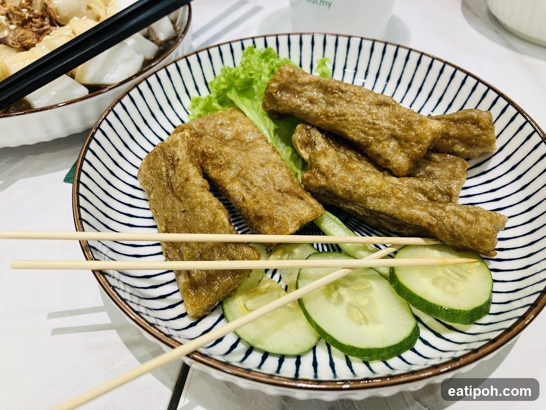 Fried Fish Cakes with Cucumber and Lettuce
