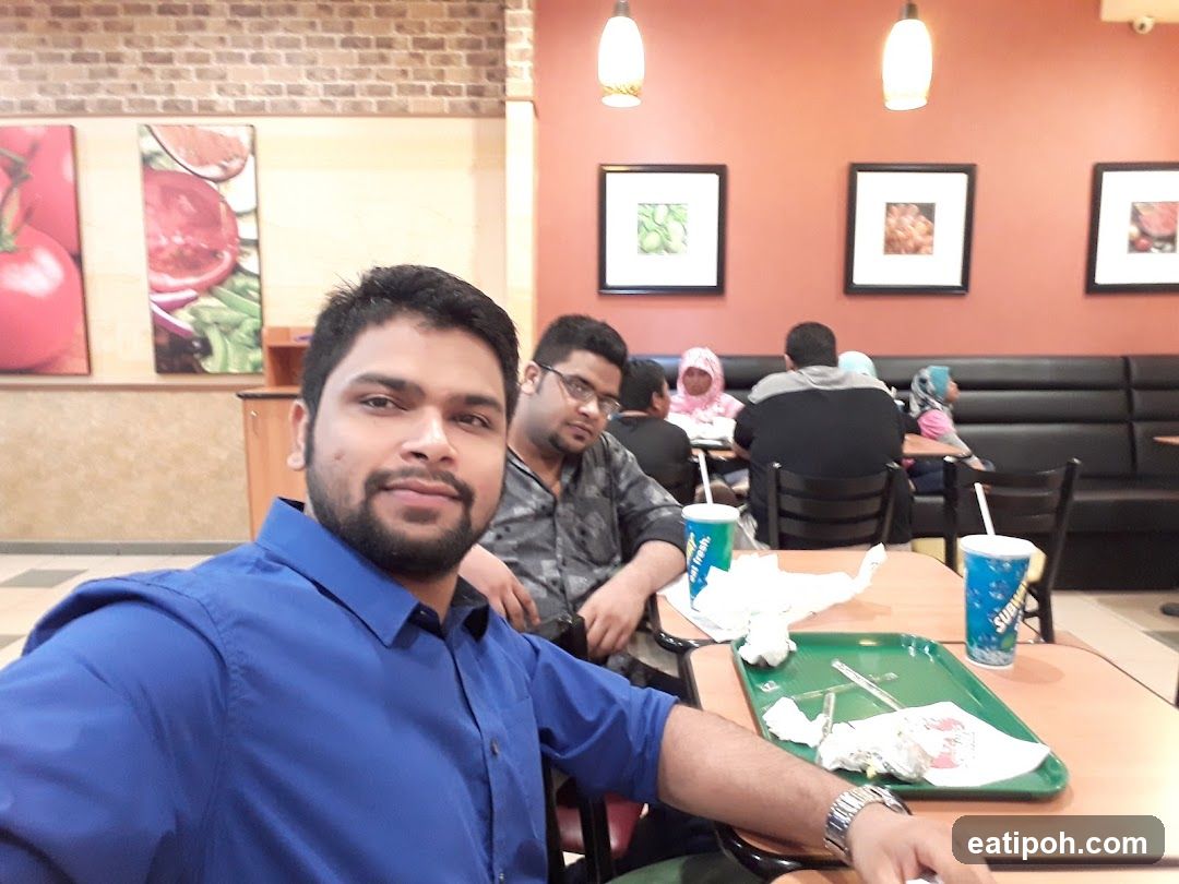 People dining at Subway