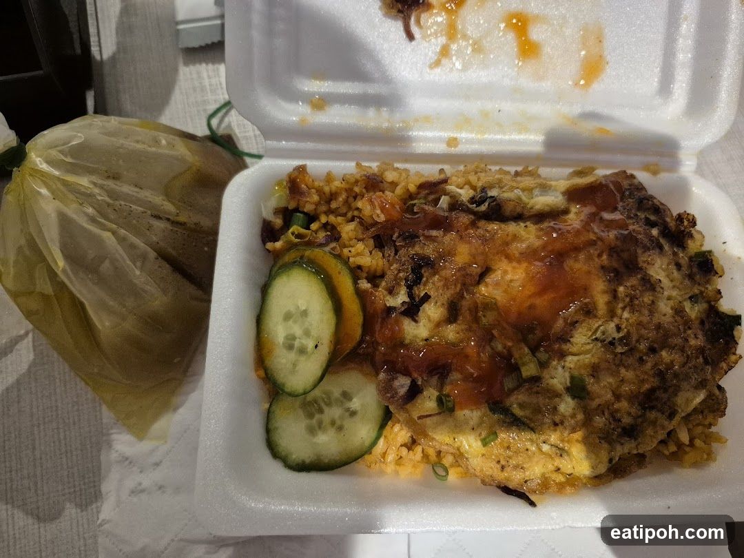 Fried Rice with Omelet and Cucumber Slices