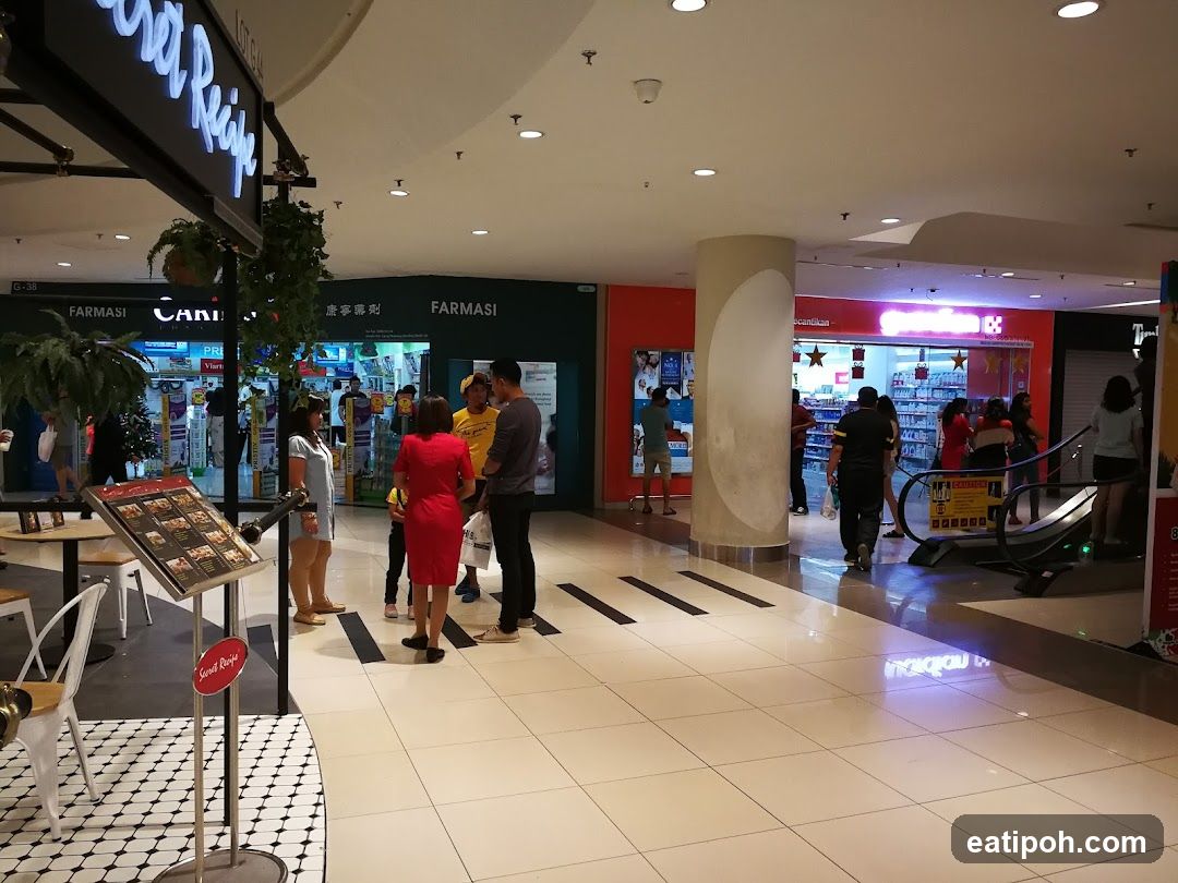 Mall Interior with Shops and People