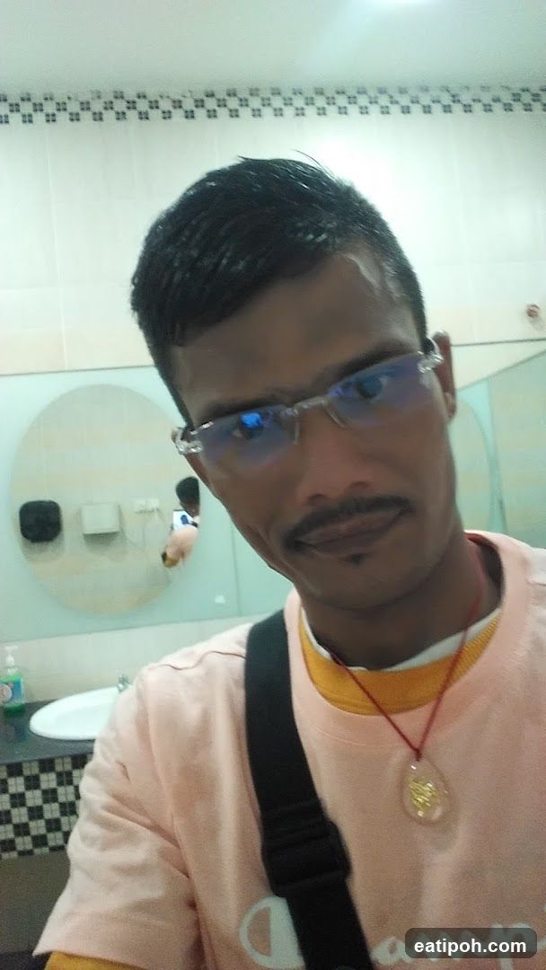 Man in a pink shirt