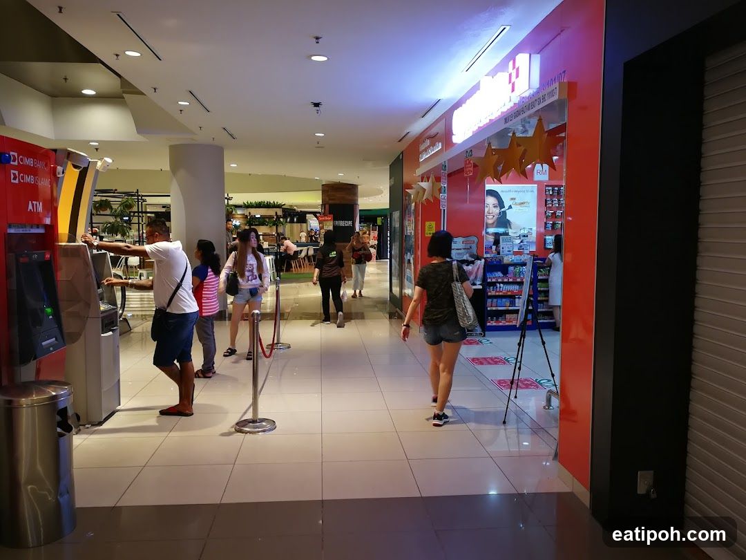 Shopping Mall Interior with ATMs and Storefront