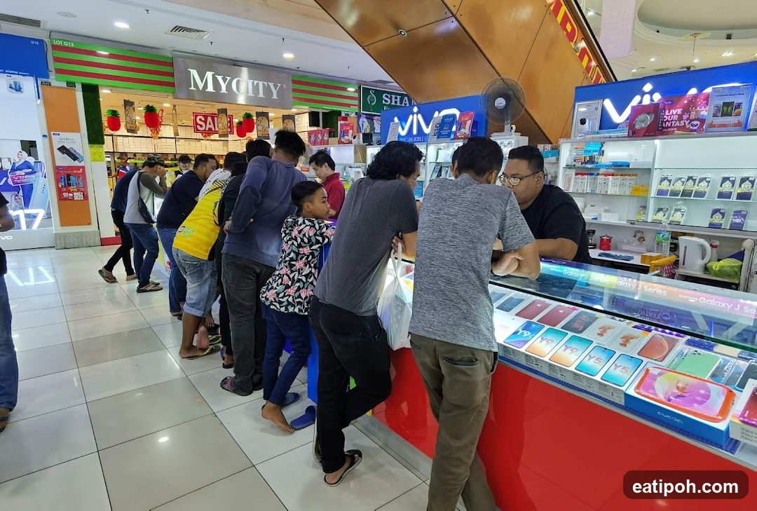 Customers at a mobile phone store