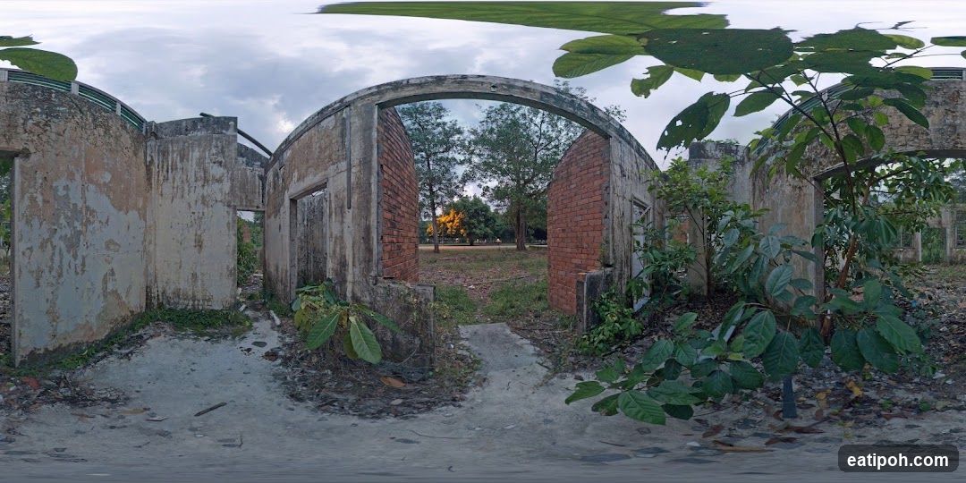 Ruined structure with archway