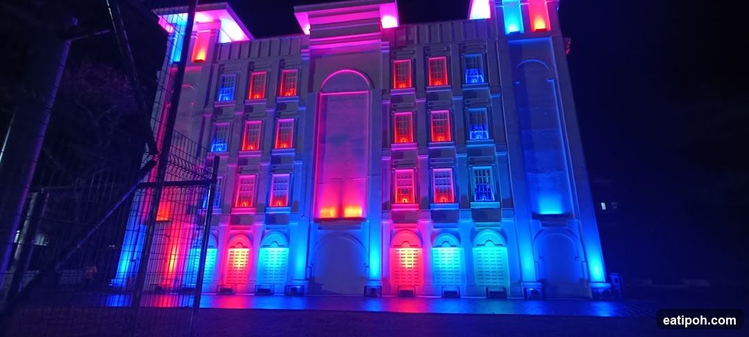 Building illuminated with colored lights