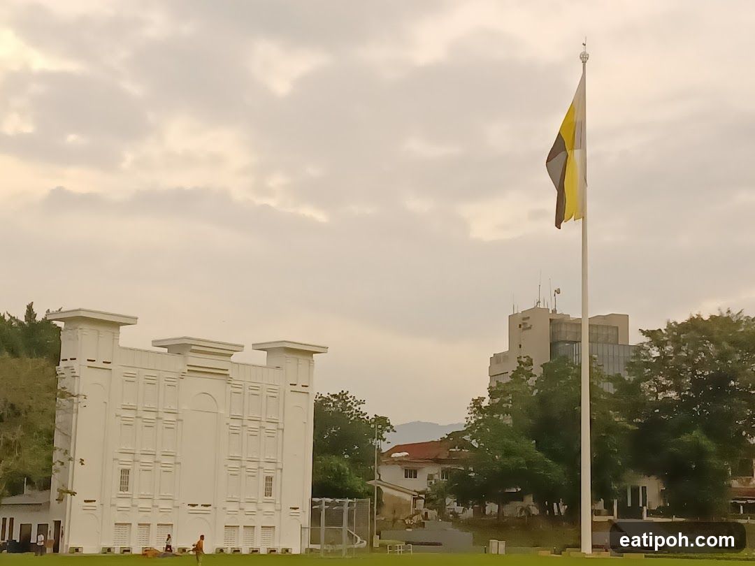White Building and Flagpole